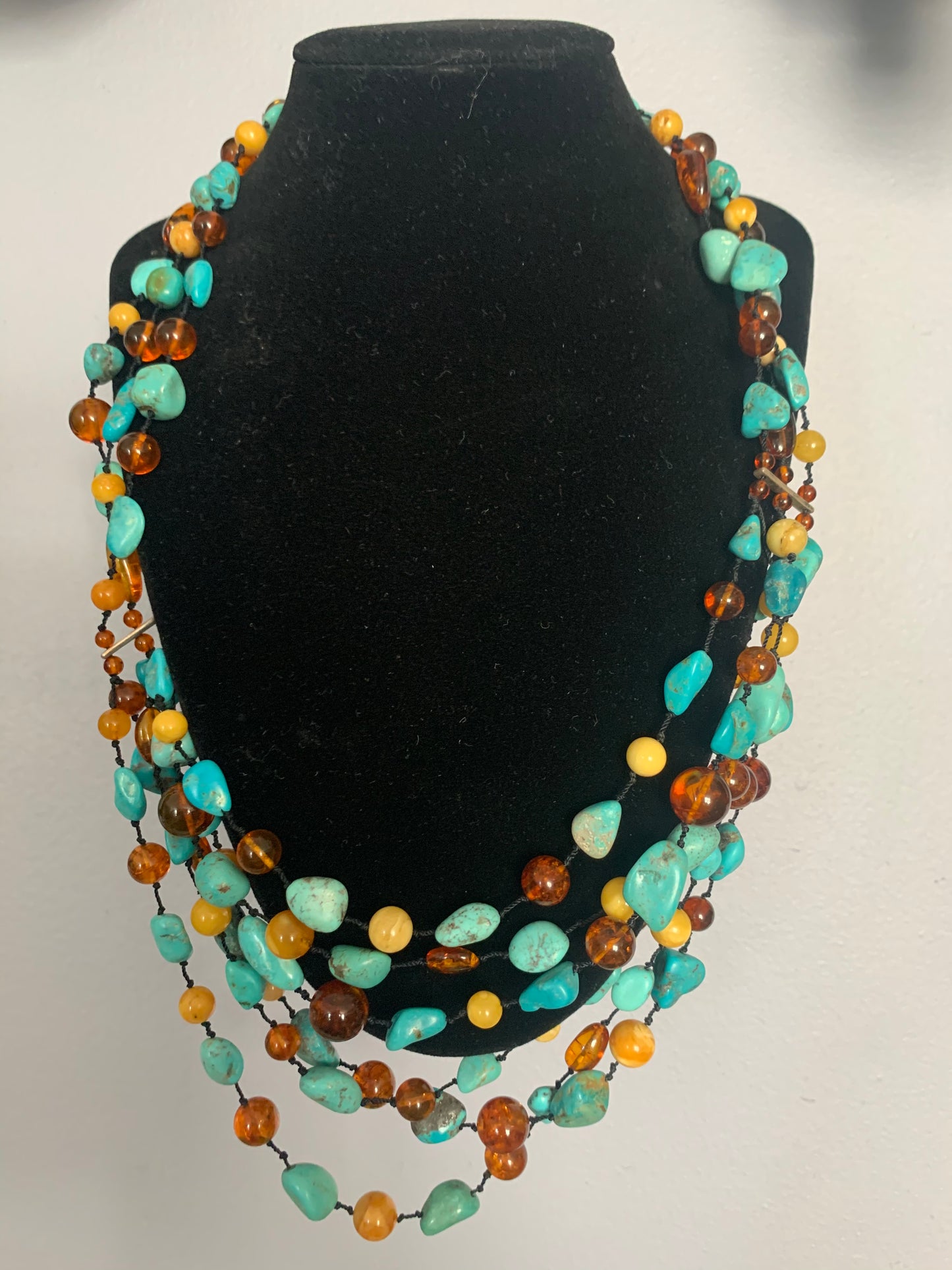 A turquoise and amber necklace