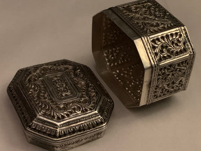 An octagonal silver box