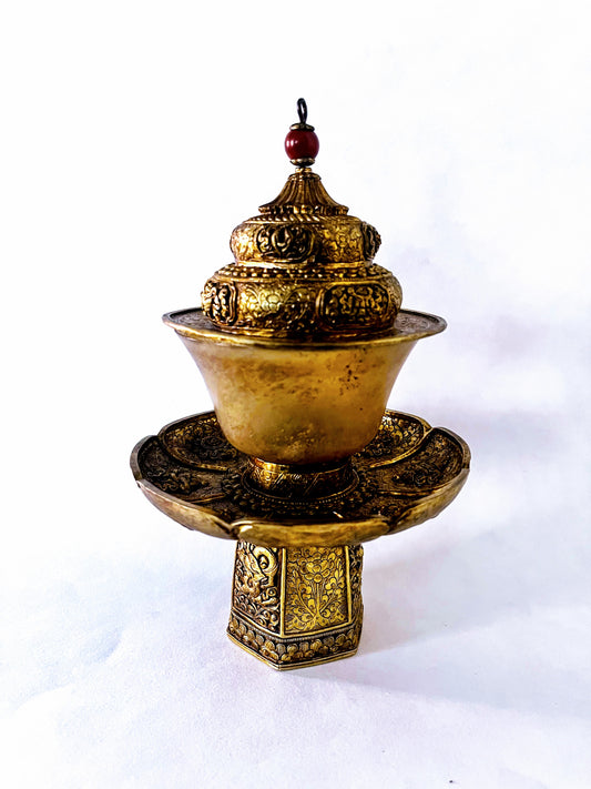 A vintage Gilt silver Tibetan cup stand