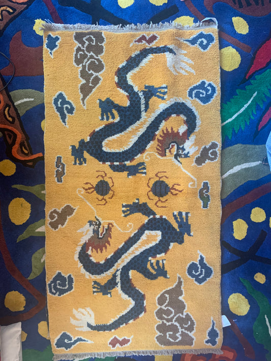 A vintage Tibetan dragon carpet