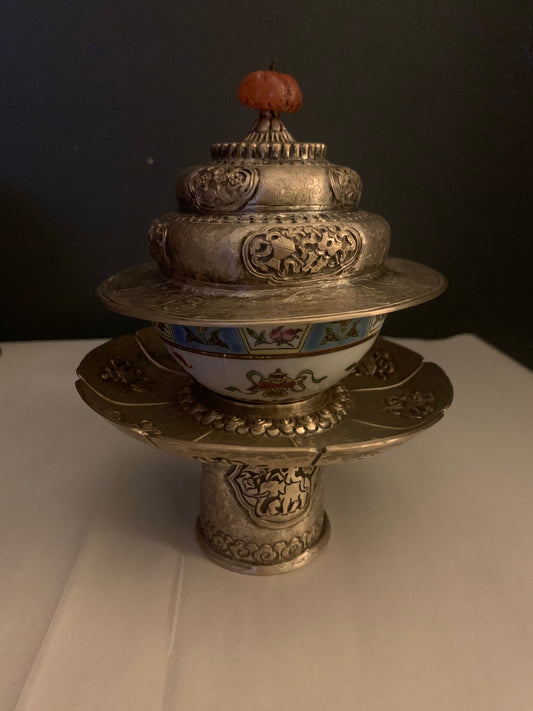 A silver Tibetan cup stand