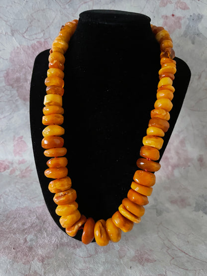 A vintage butterscotch amber bead necklace