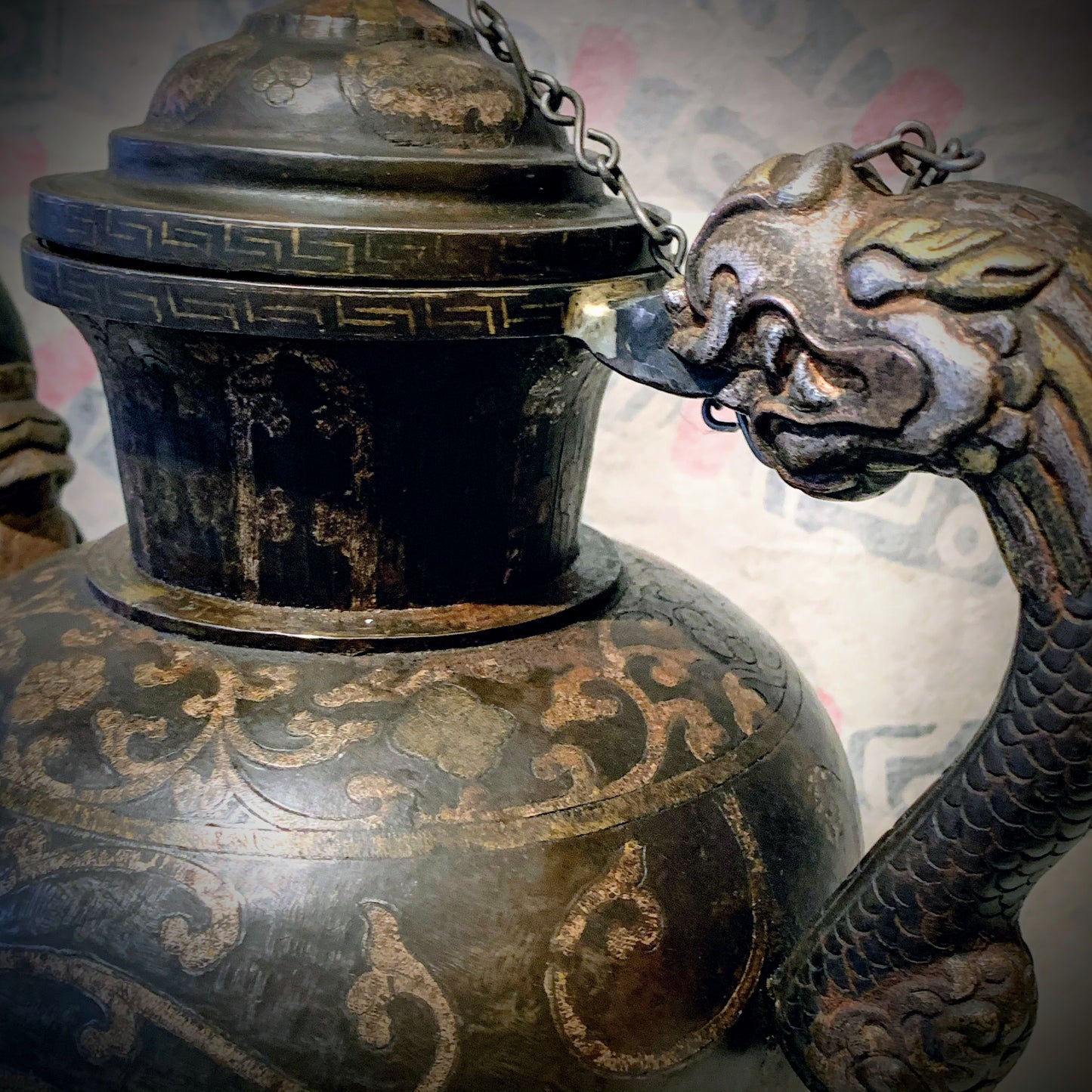 An antique Tibetan iron and silver teapot
