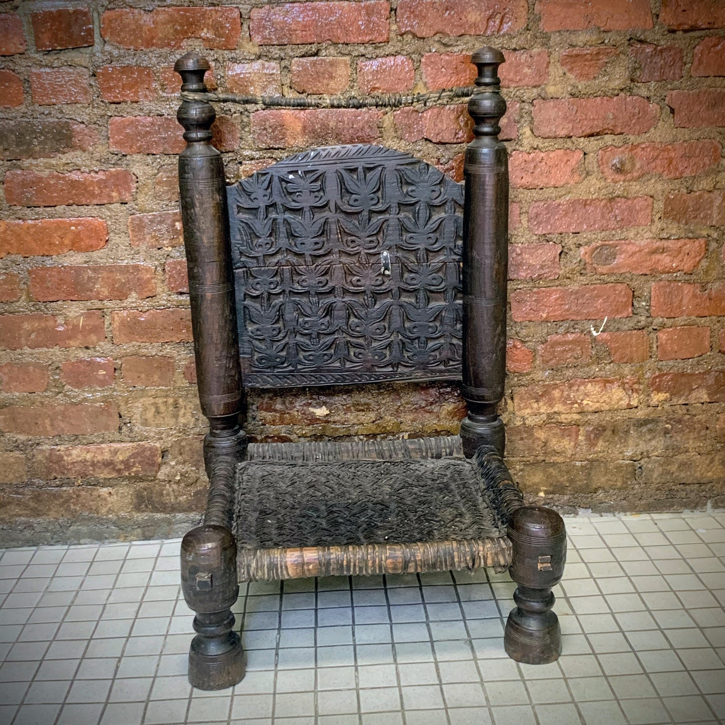 Low antique Indian chair