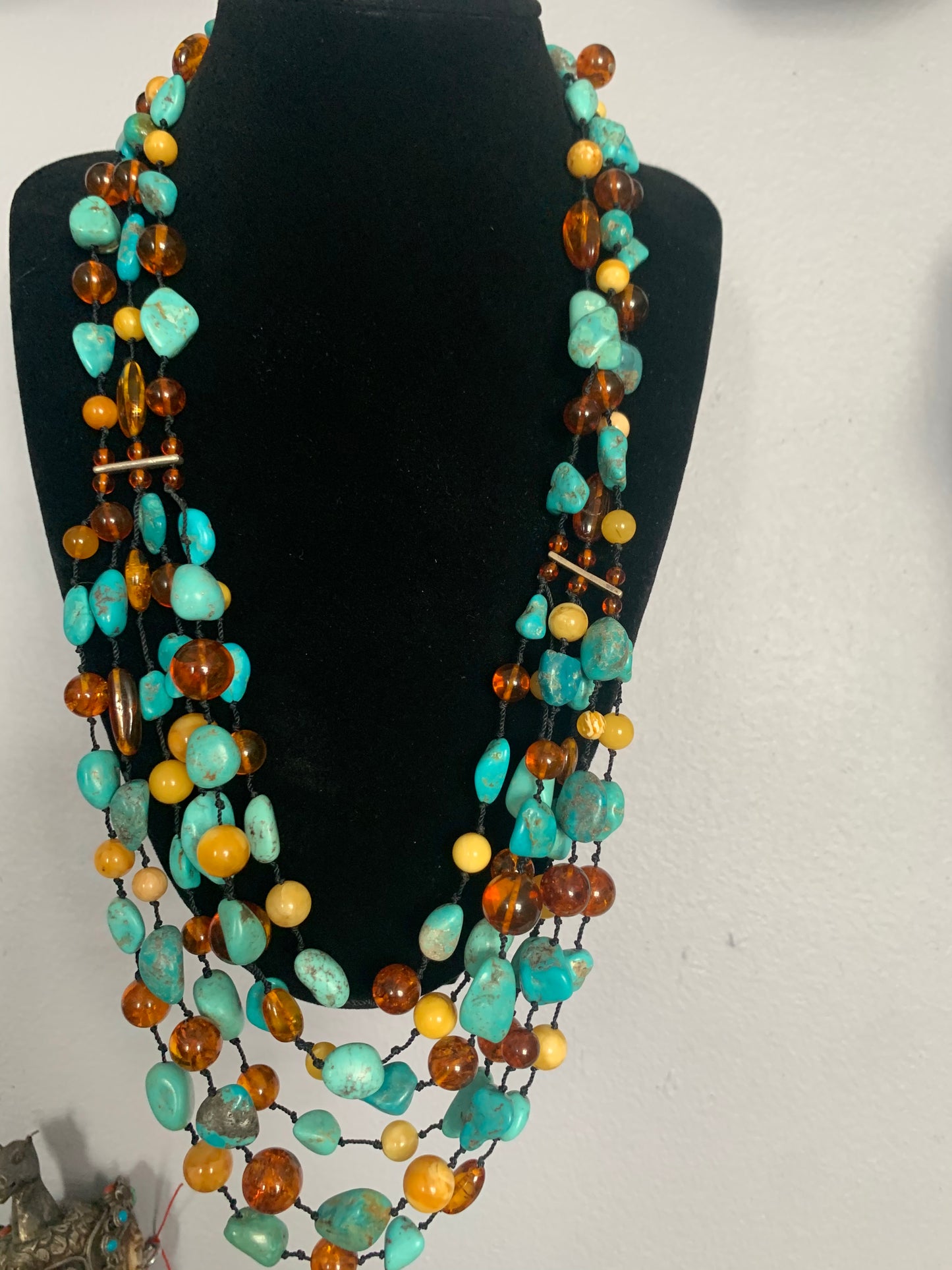 A turquoise and amber necklace