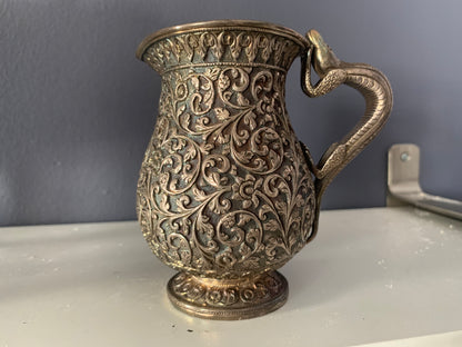 A silver creamer