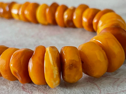 A vintage butterscotch amber bead necklace