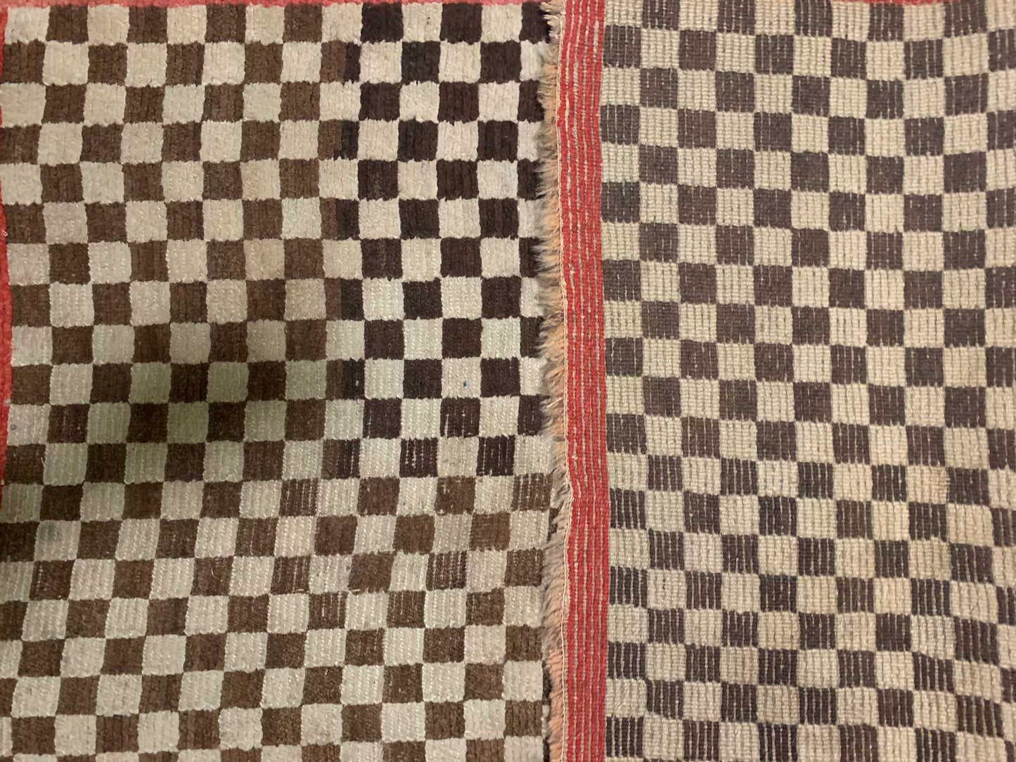 An antique Tibetan checkerboard rug