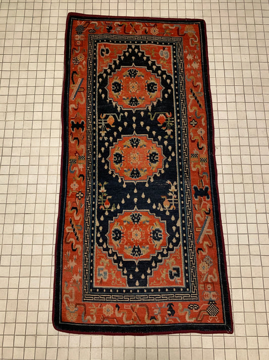 Antique Tibetan rug