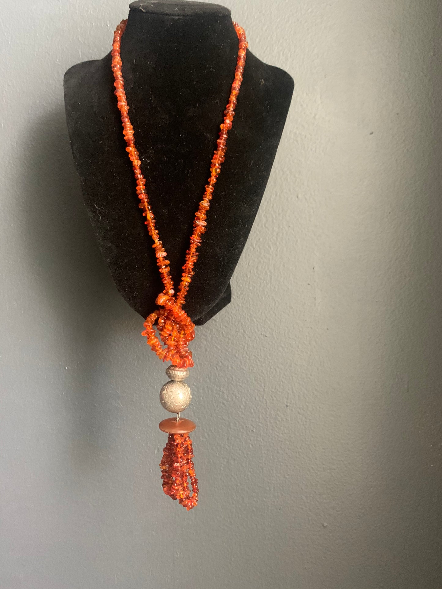 An amber and silver necklace