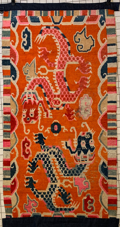 A 19th C., unique antique Tibetan dragon rug