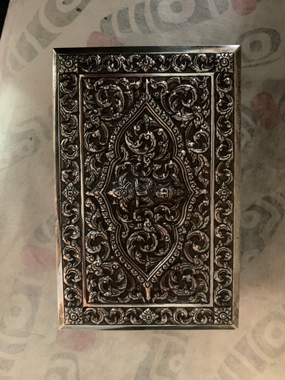 An antique cylindrical Thai silver box
