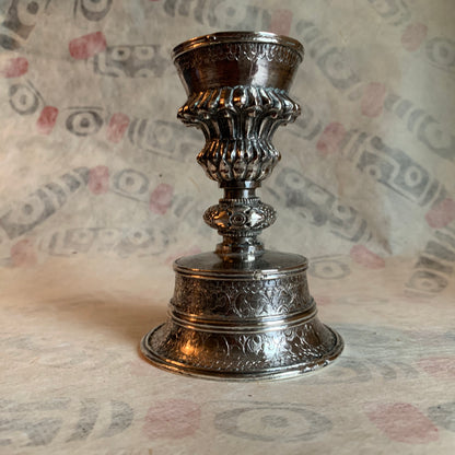 A silver Tibetan butterlamp