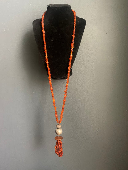 An amber and silver necklace