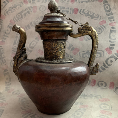 An antique Tibetan bronze teapot