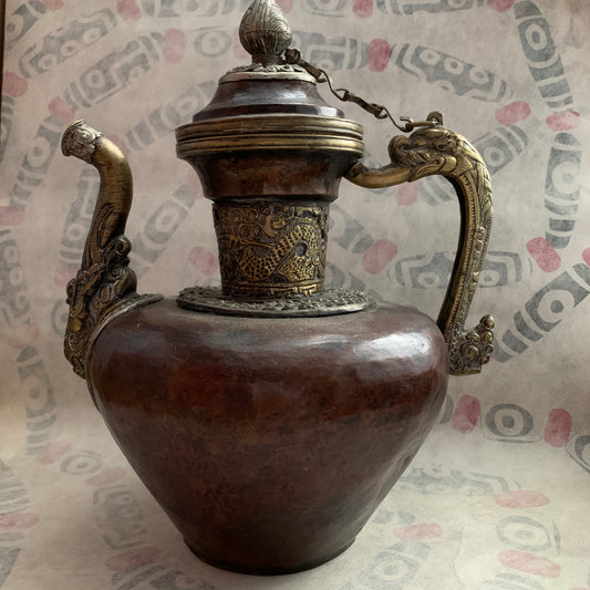 An antique Tibetan bronze teapot