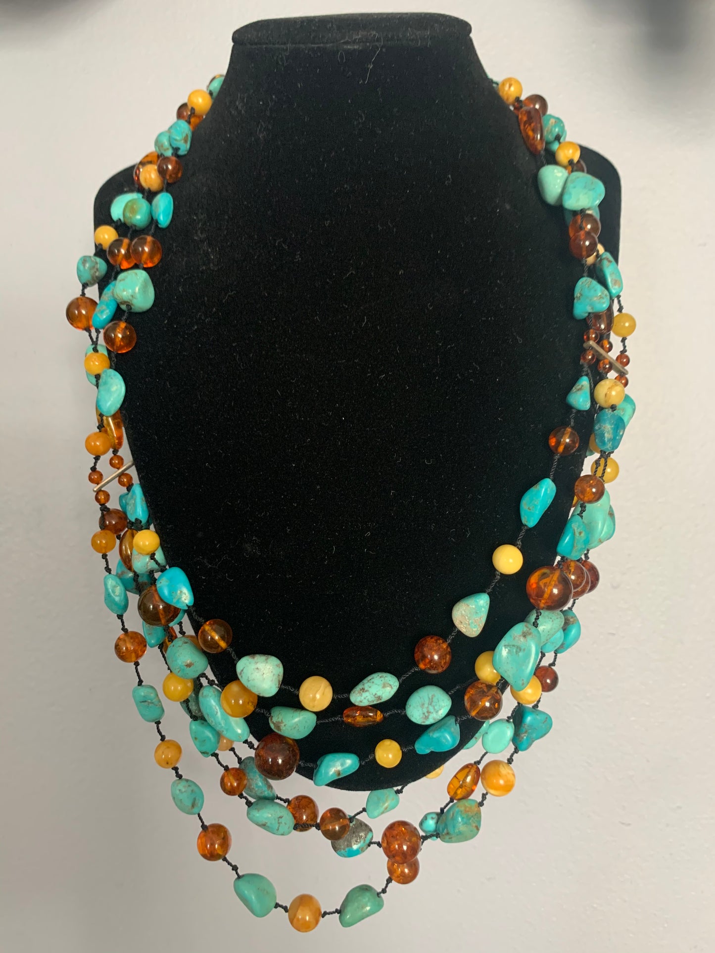 A turquoise and amber necklace