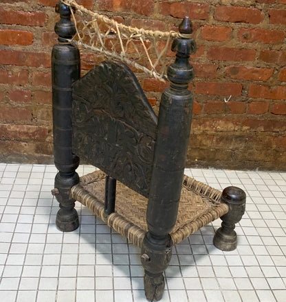 Low antique Indian chair
