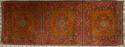 An antique triple seater Tibetan meditation rug