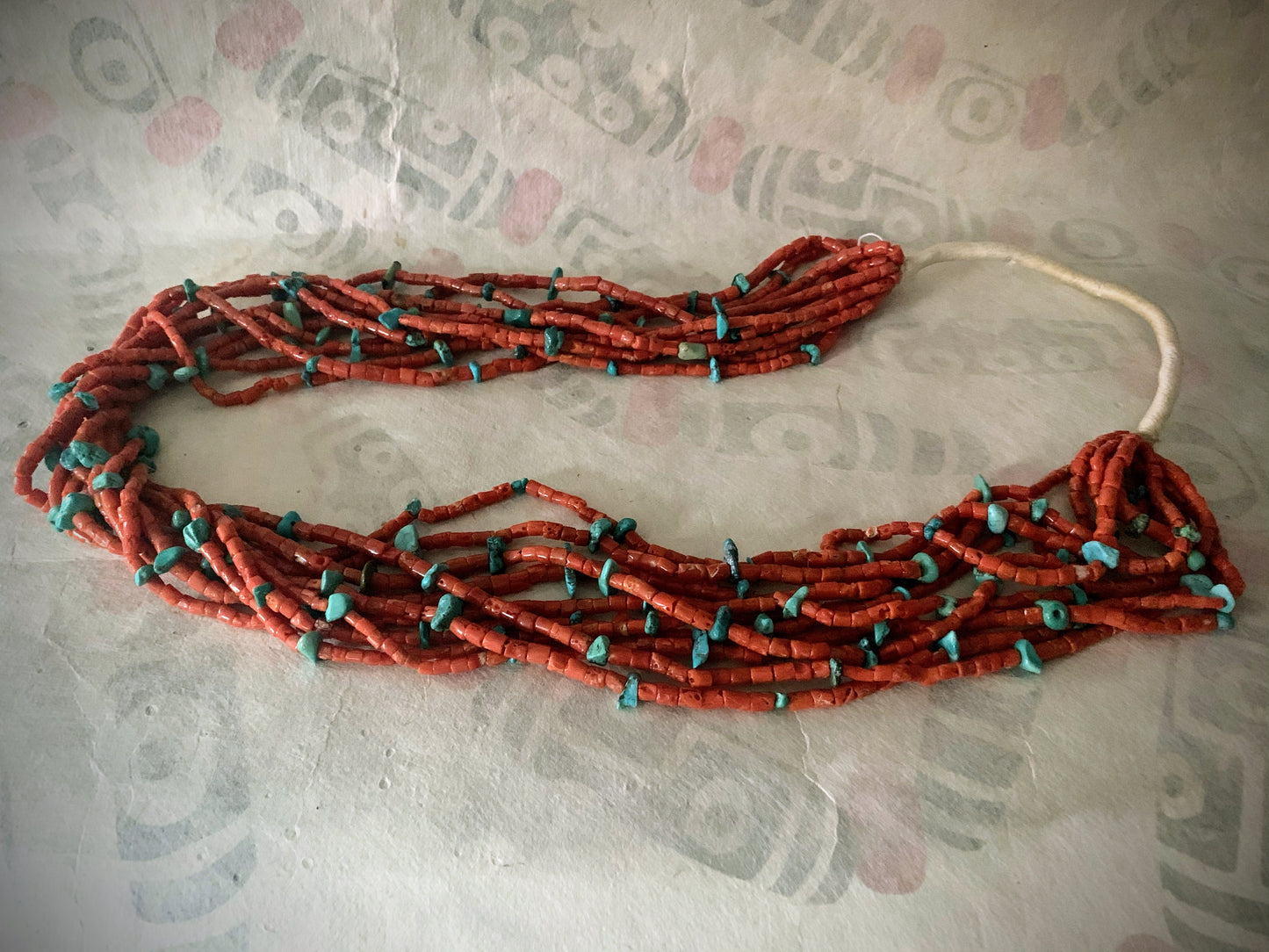 A vintage Native American coral and turquoise necklace