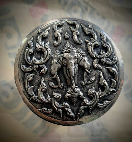 An antique cylindrical Thai silver box