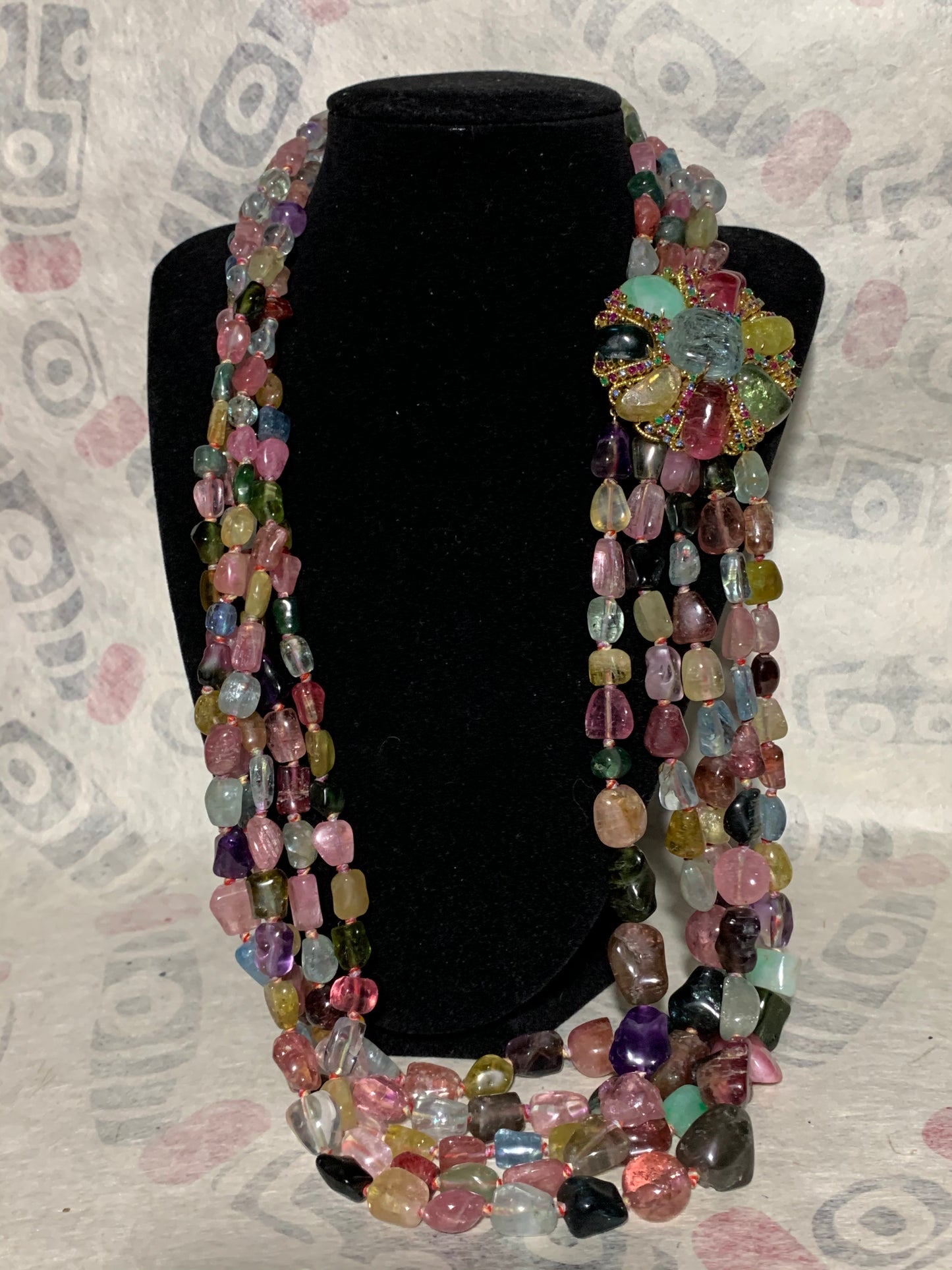 A Tourmaline necklace with a 14kt clasp brooch