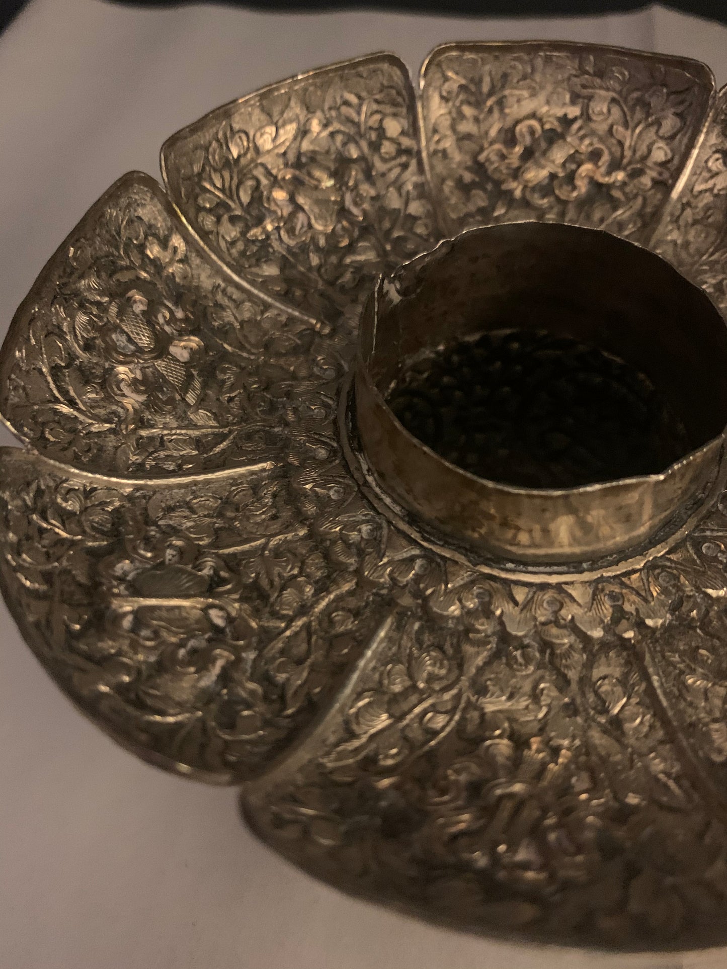 A silver Tibetan cup stand