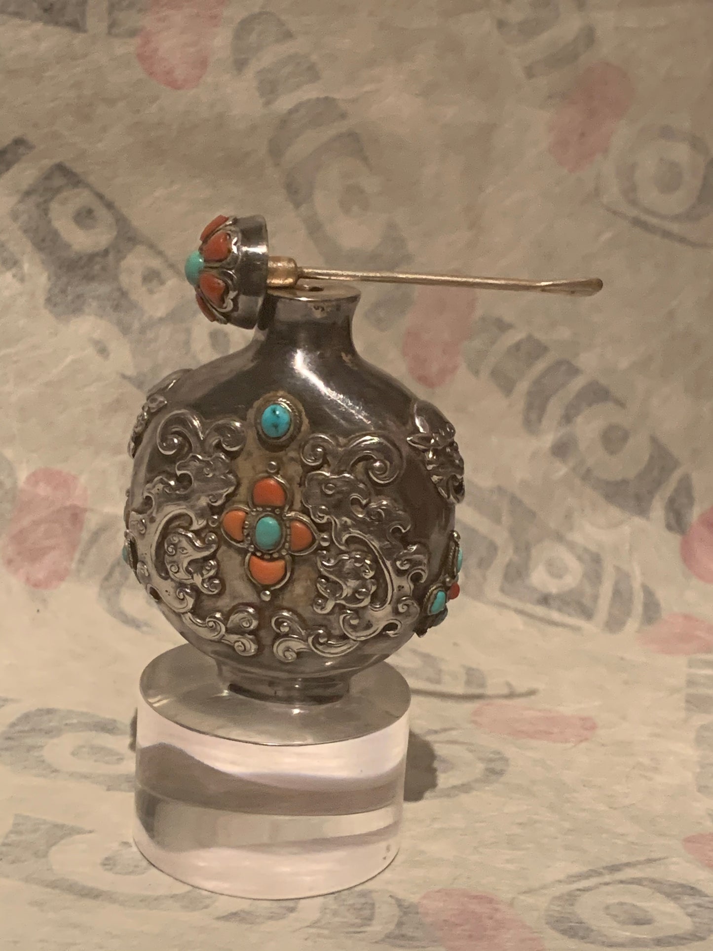 A Mongolian silver snuff bottle - with coral and turquoise