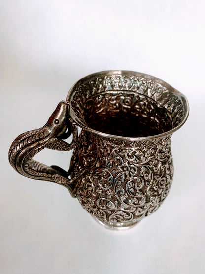 A silver creamer