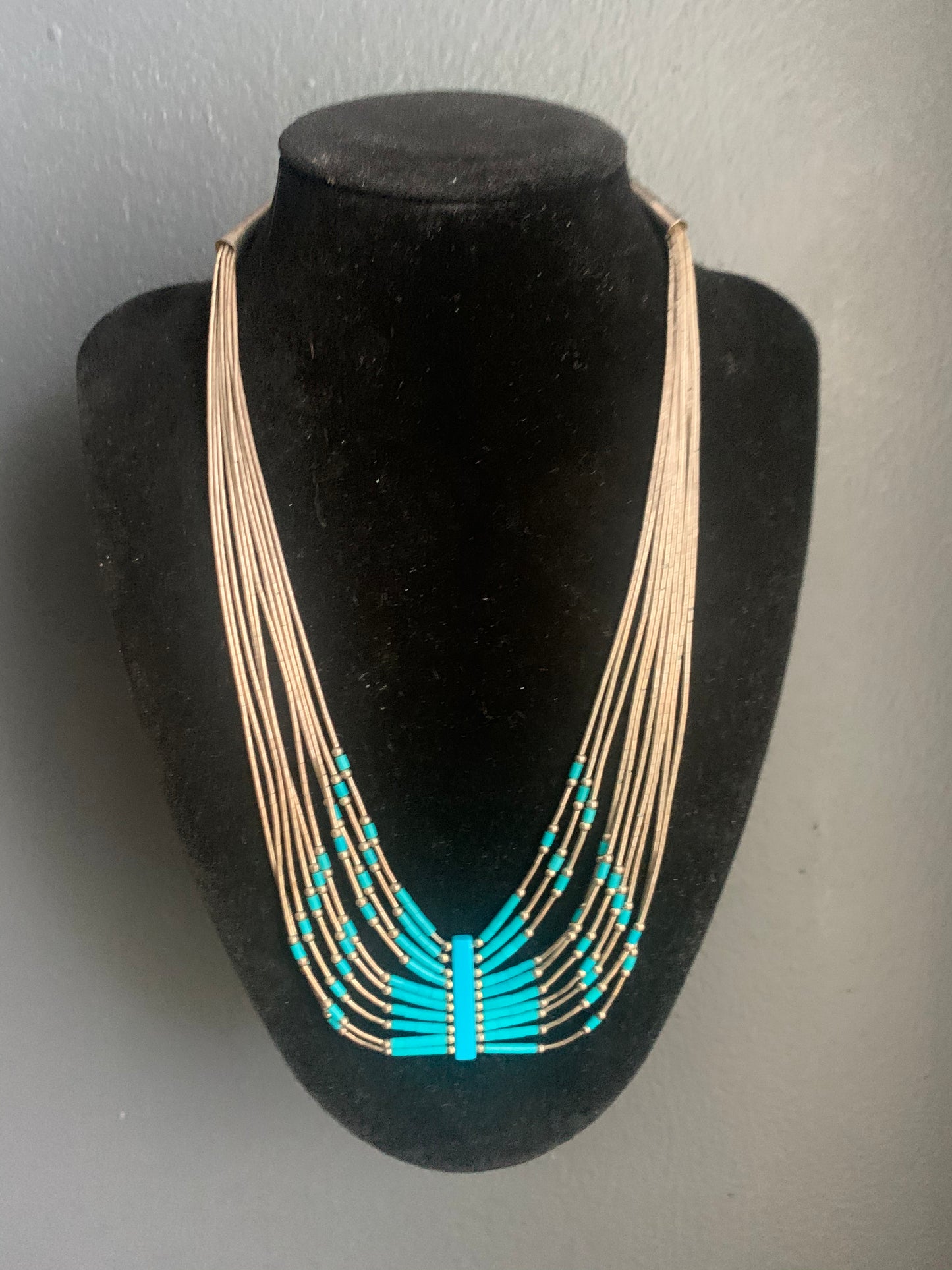 A turquoise and silver necklace