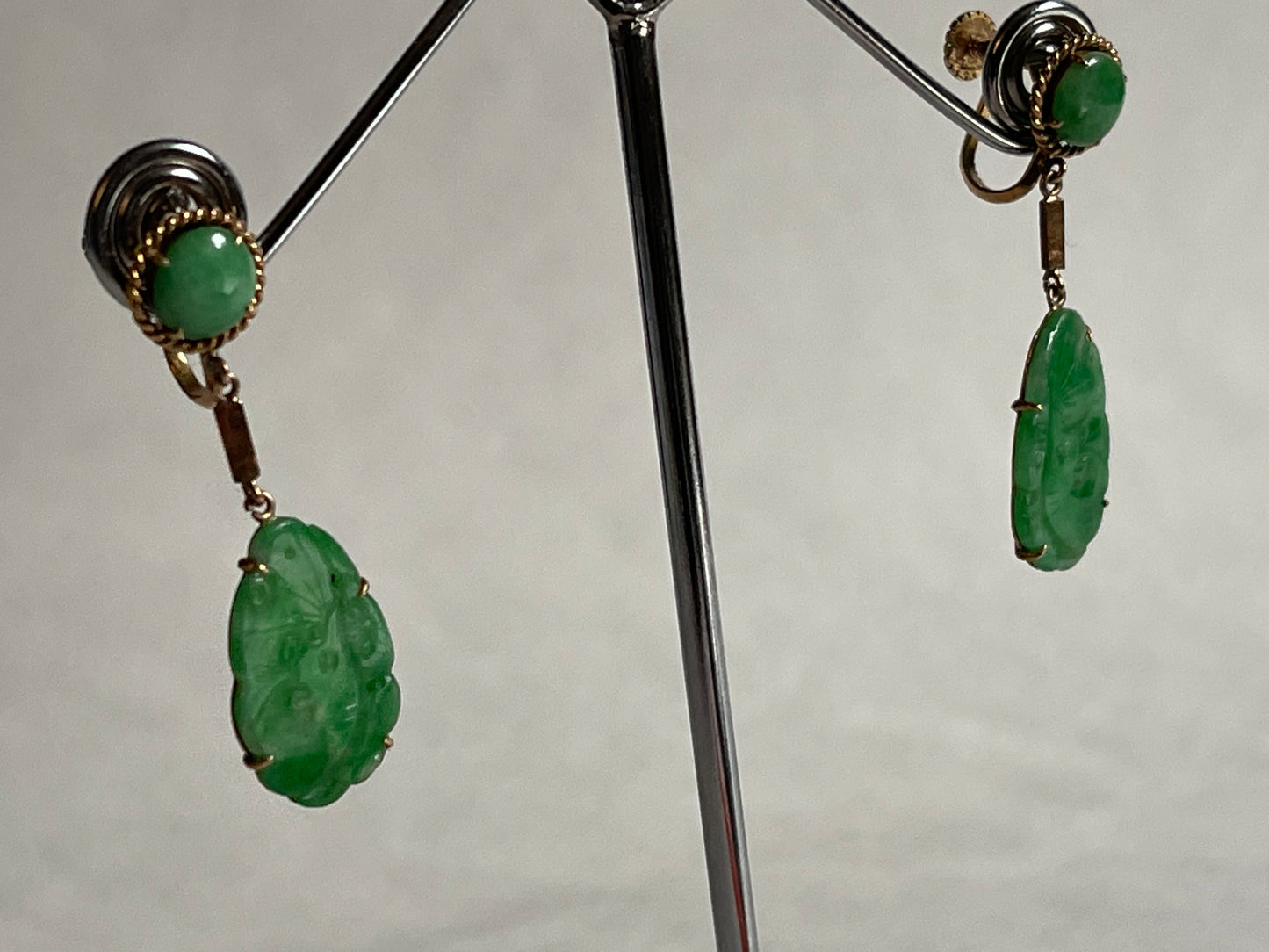 A pair of vintage apple green jadeite  dangling earrings in a 14kt setting