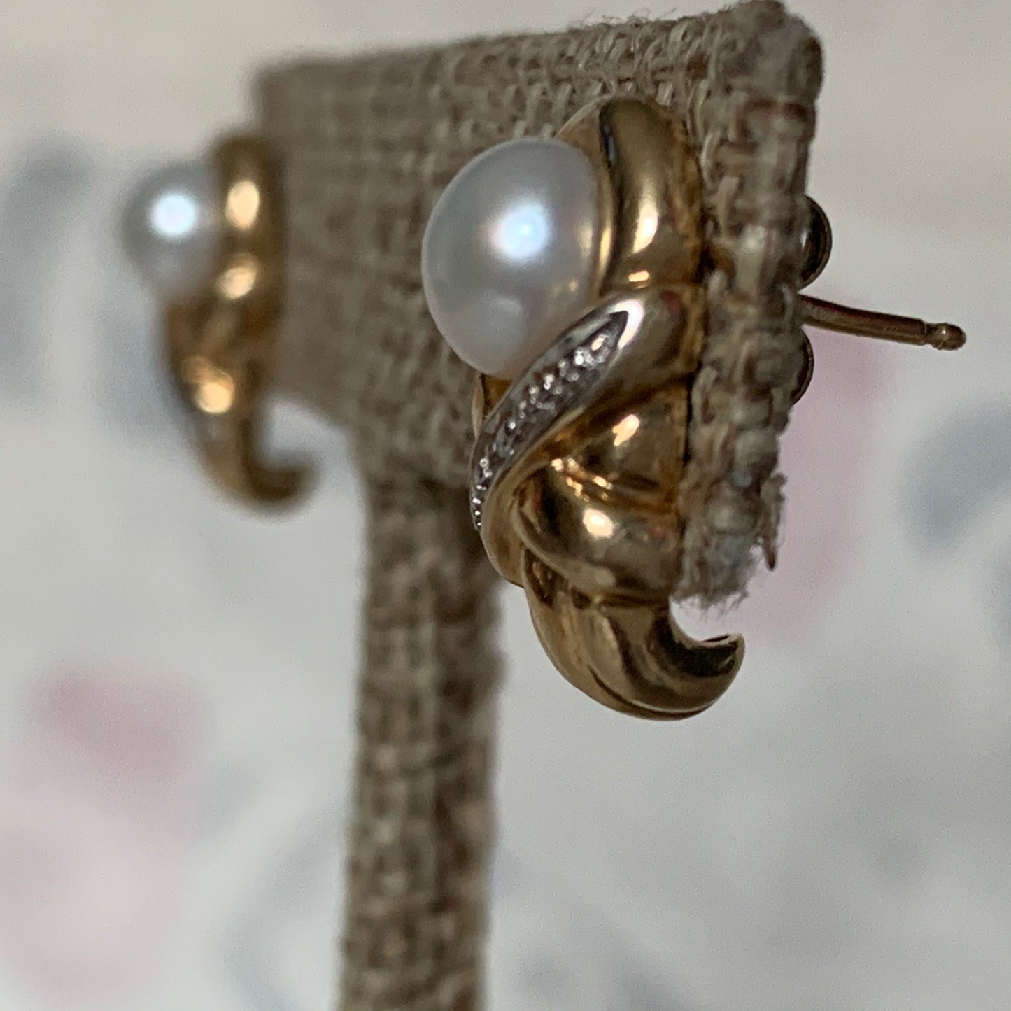 A pair of vintage pearl earrings