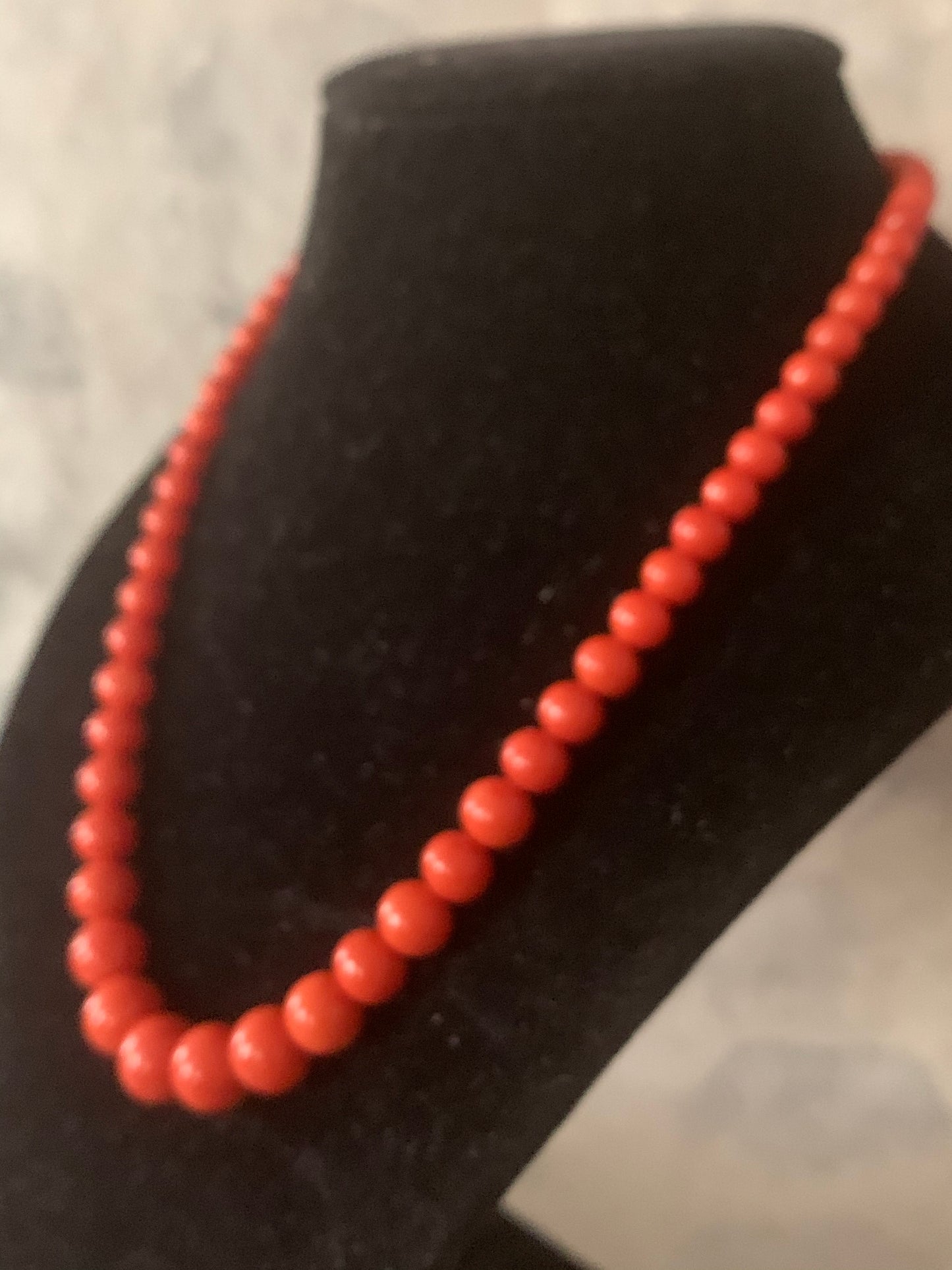 A 16” long antique coral necklace