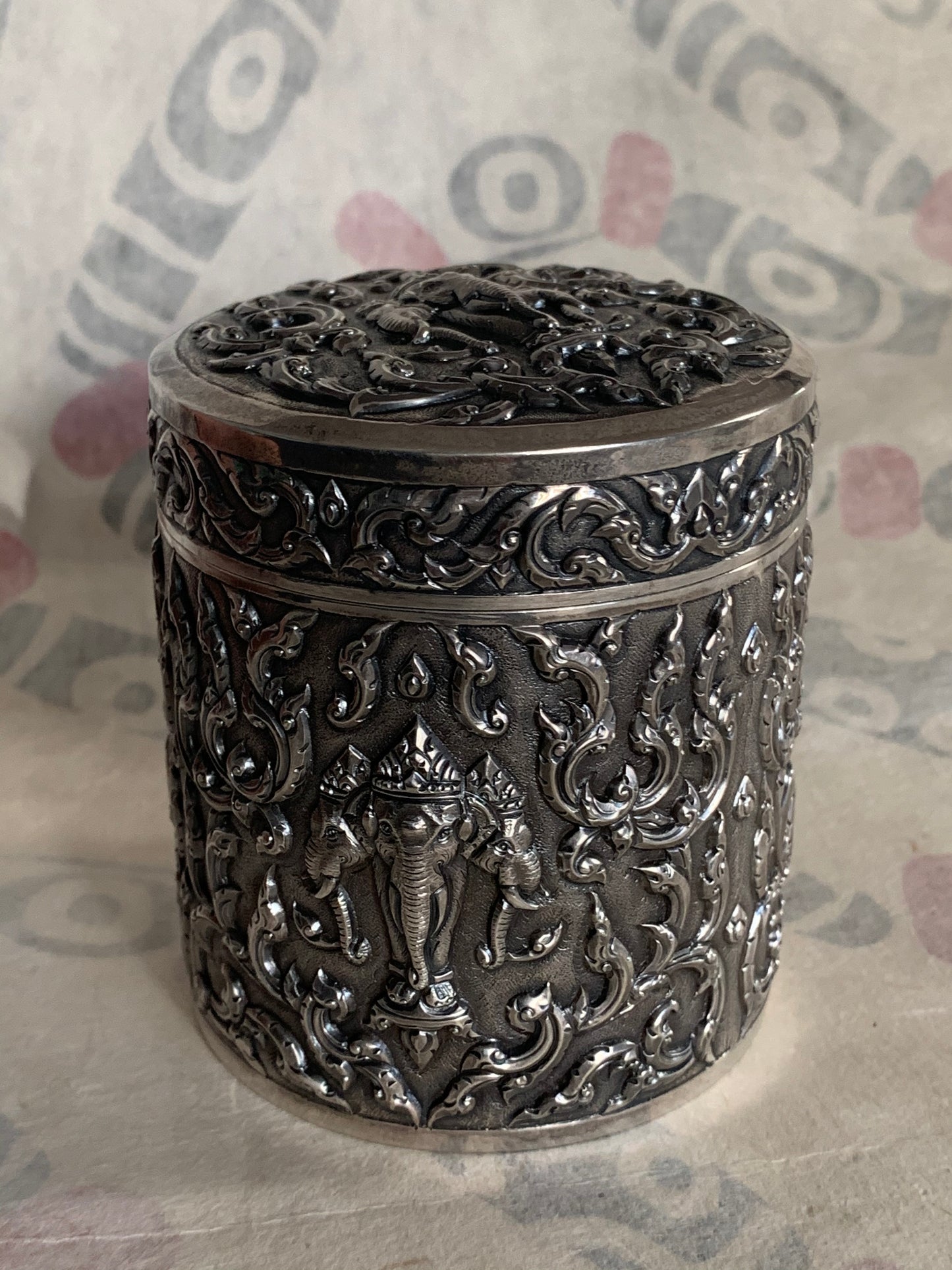 An antique cylindrical Thai silver box