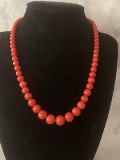 A 16” long antique coral necklace