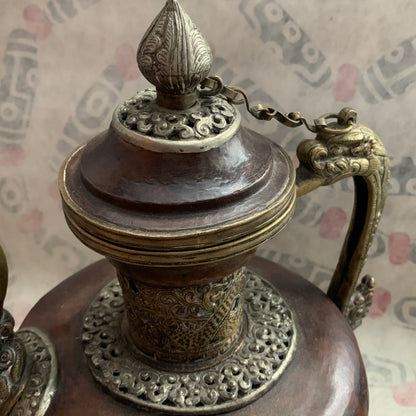 An antique Tibetan bronze teapot