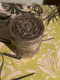 A cylindrical metal box