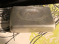 A silver box with hinged lid
