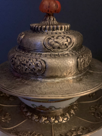 A silver Tibetan cup stand