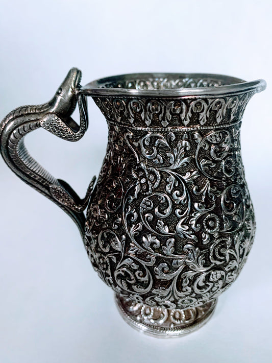 A silver creamer