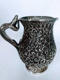 A silver creamer