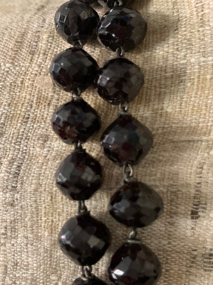 An antique faceted garnet necklace