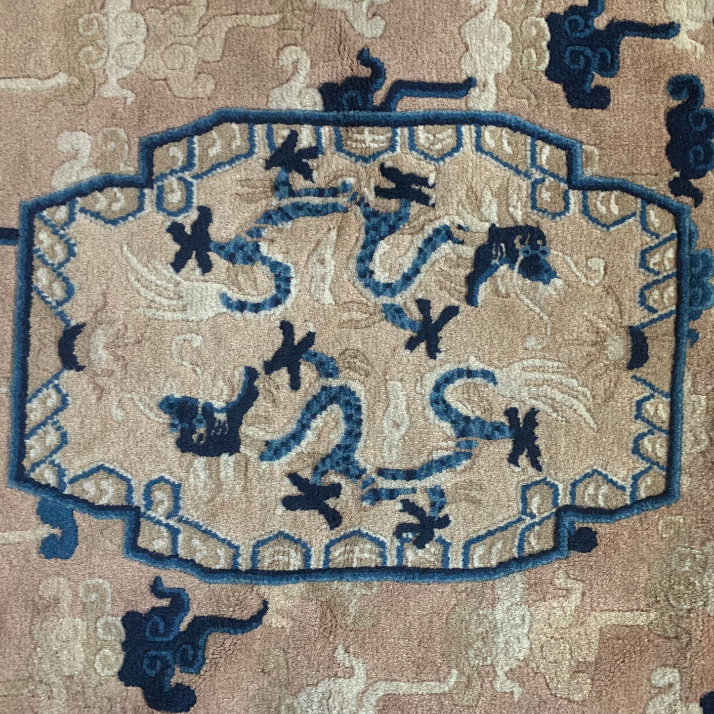 An antique ningxia dragon rug