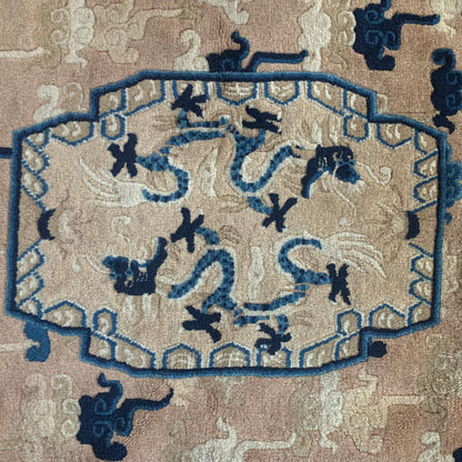 An antique ningxia dragon rug