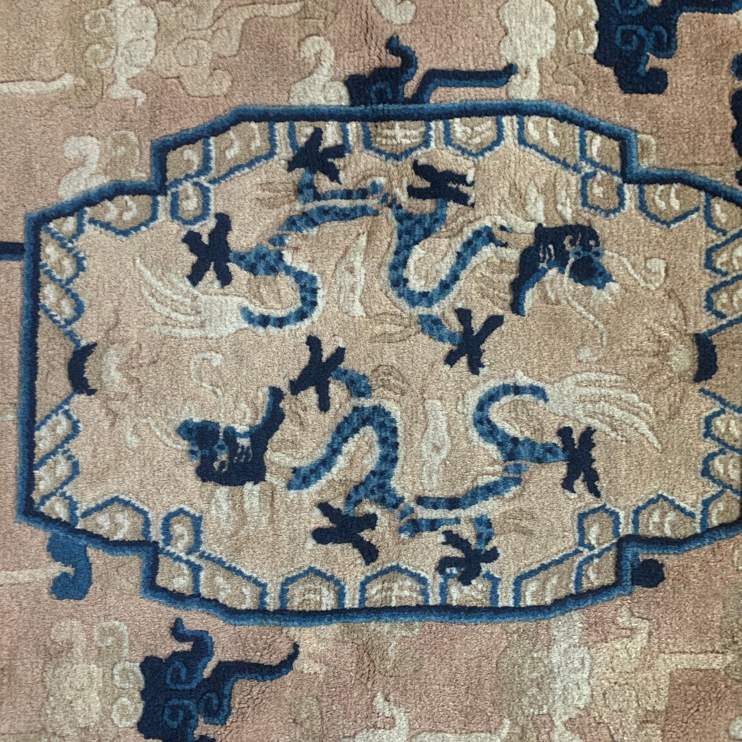 An antique ningxia dragon rug