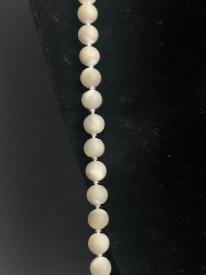 A mother of pearl necklace
