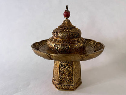A vintage Gilt silver Tibetan cup stand