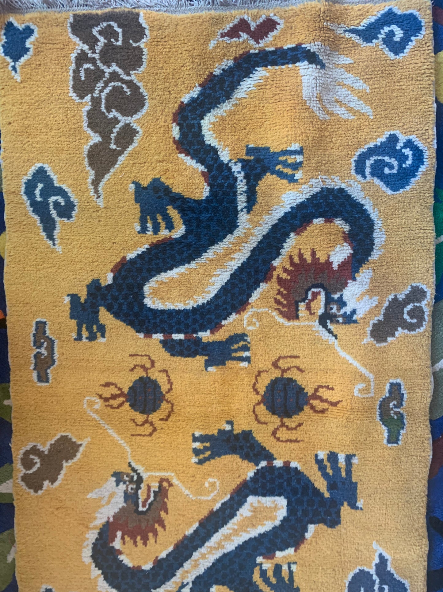 A vintage Tibetan dragon carpet