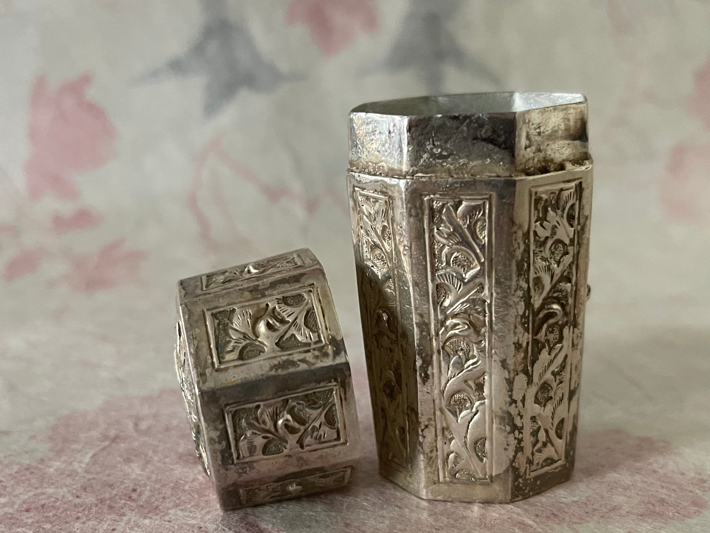 An antique octagonal shaped silver box with lid from south east Asia.