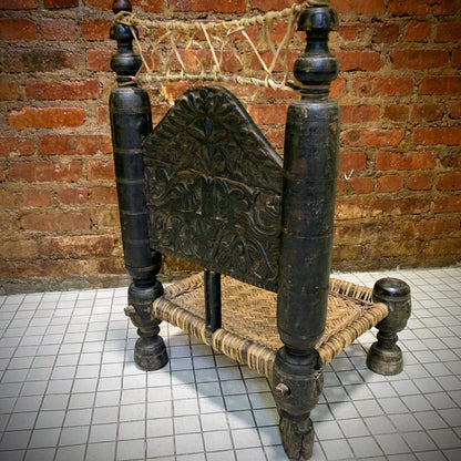 Low antique Indian chair